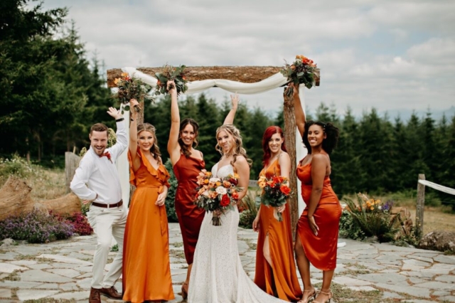 Bridesmaids in Front of Arbor